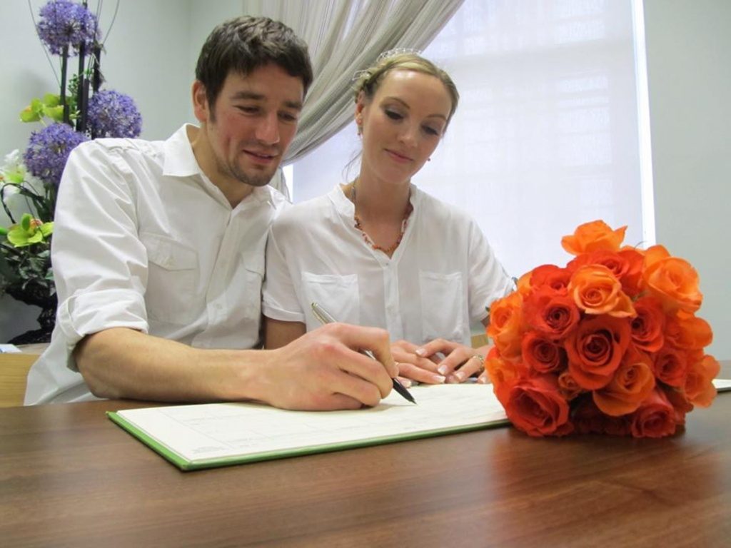 Amelia and Brett getting registered in the Town Hall in Trowbridge, UK – Pic from Fortitude Press