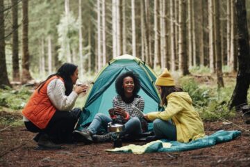 Girls camping in the woods