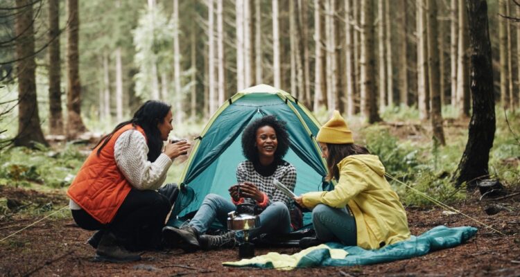 Girls camping in the woods