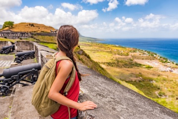 traveler gazing over the island