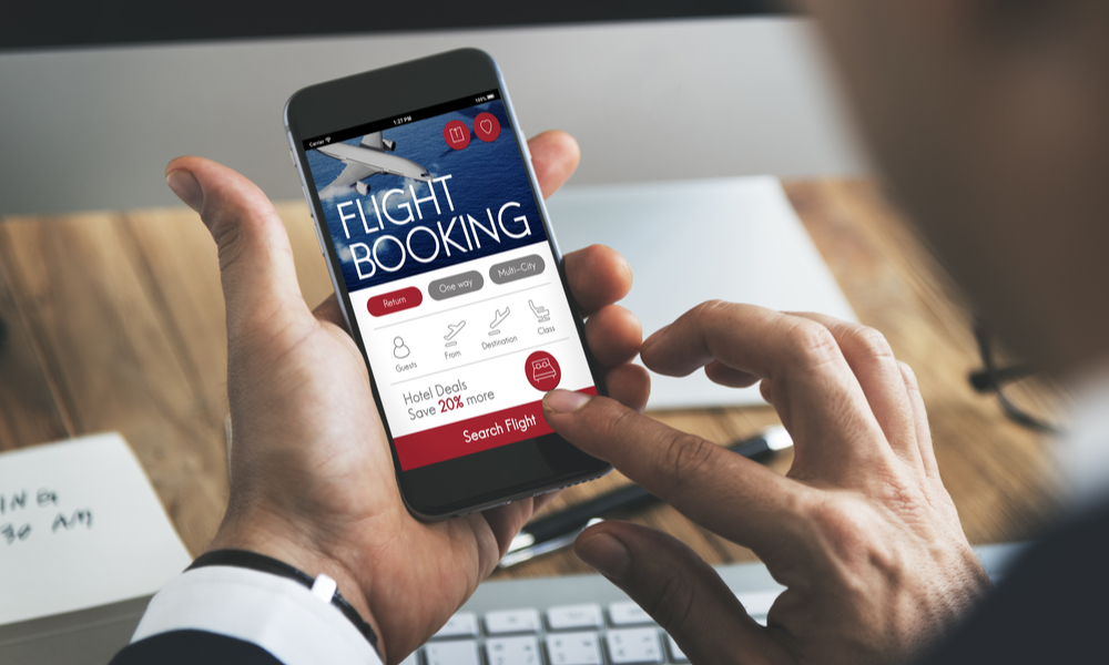 man booking flight online