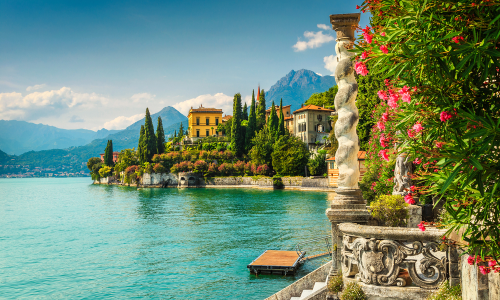 Famous luxury villa Monastero, stunning botanical garden decorated with mediterranean oleander flowers, lake Como, Varenna,