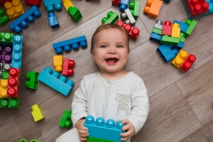 Toddler with leggos