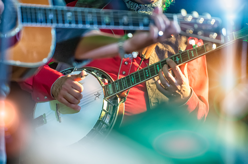 Banjo player in the country band nashvillemusicbluegrassbanjocountrybandconcertplayerstreetlivemusicianguitarperformerstageartistperformanceentertainmentrockfringesguitaristinstrumentmanmusicalperformingplayshowsoundShow more