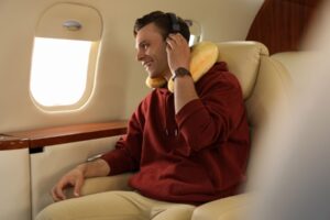 Man relaxing on flight