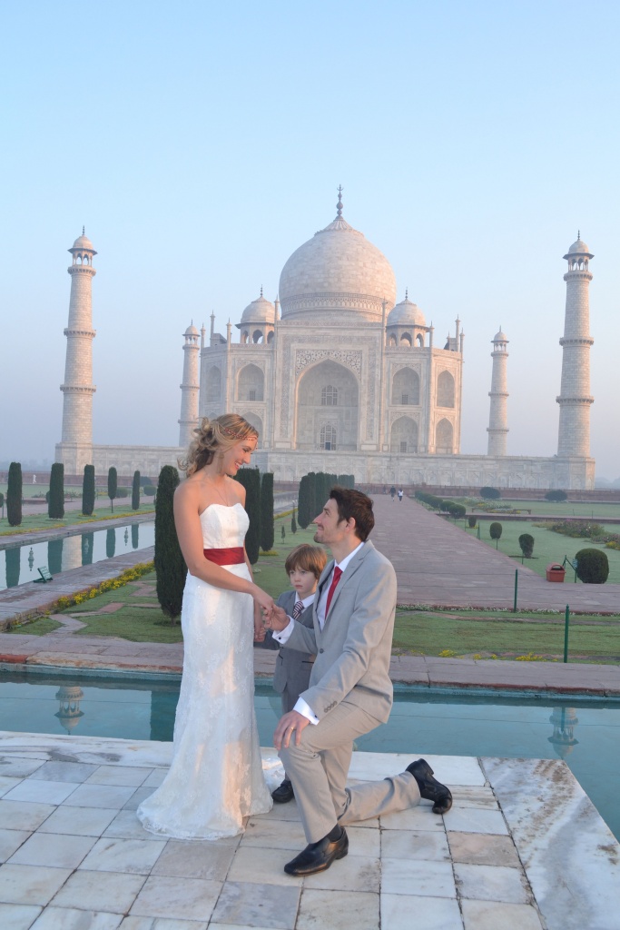 PIC FROM FORTITUDE PRESS (PICTURED - AMELIA AND BRETT GETTING MARRIED IN INDIA AT THE TAJ MAHAL) A LOVED-UP couple whose wedding plans were dashed after they clashed with a family member’s marriage have gone on to tie the knot in EIGHT different countries. Amelia Irwin, 32, was faced with a dilemma after her wedding was planned in the same month as that of a family member of her partner Brett, 33, last year. But the couple, who met nine years ago, decided to tie the knot in a registry office so they could save £10,000 which they went on to use to travel the globe. And since they got married in Trowbridge last year, the couple have been blessed and enjoyed ceremonies at locations across the globe including Paris, Moscow, Beijing and Nepal. SEE FORTITUDE PRESS COPY