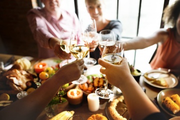 family around holiday dinner table