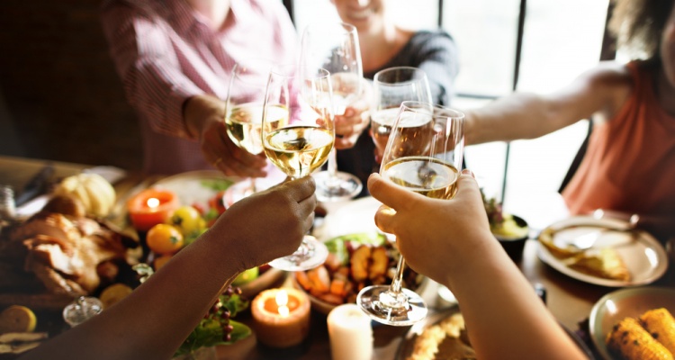 family around holiday dinner table