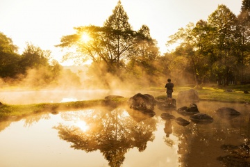 Morning fog over hot spring at Chae Sorn National Park, Thailand