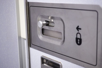 Airplane lavatory door lock handle.