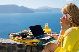 Woman working while traveling