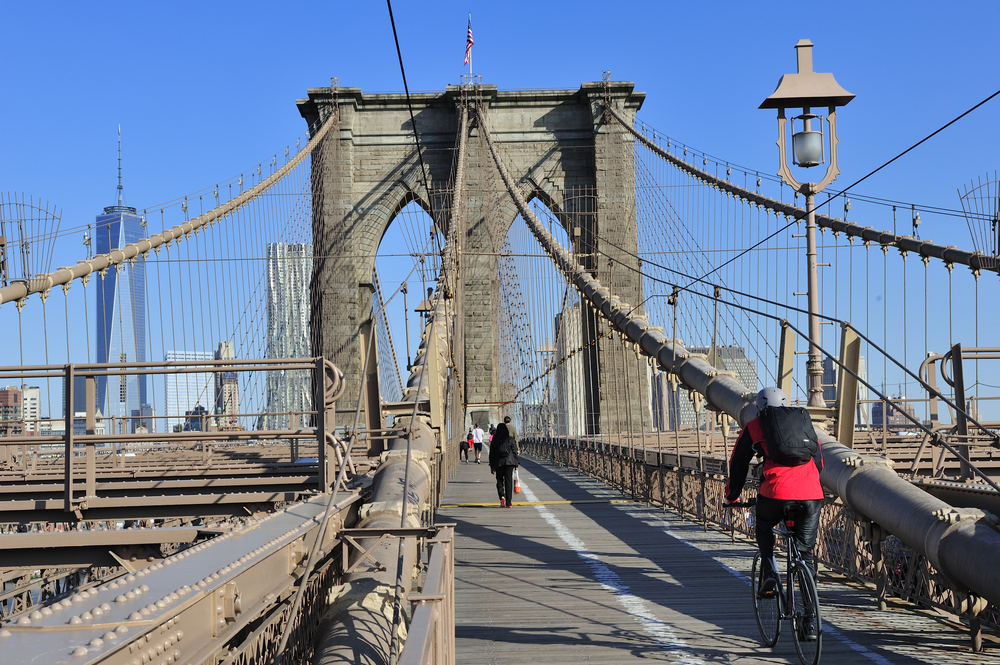 New York City, USA, - May. 19. 2014: Bike riders commuting to Manhattan over Brooklyn Bridge. New York, USA