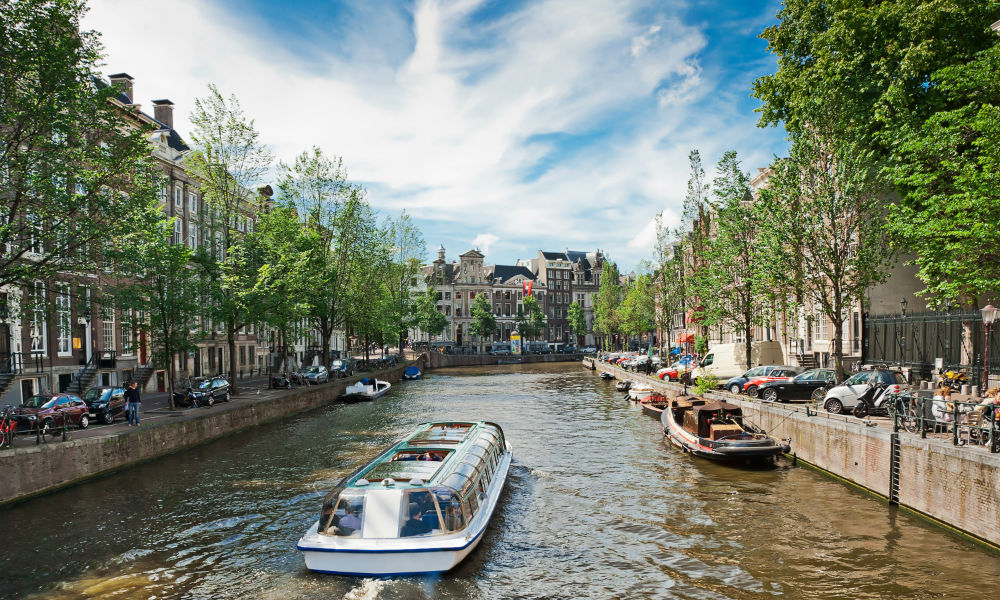 a canal cruise boat in amsterdam