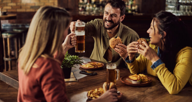 friends enjoying the best burgers in each state