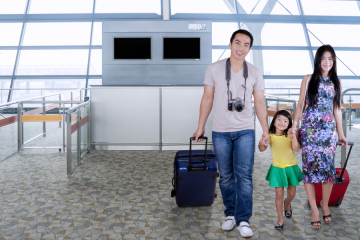 asian american family at airport