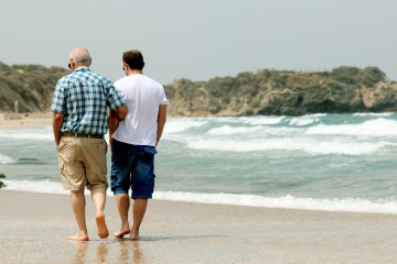 Senior father & adult son on a trip