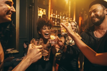 friends drinking in bar