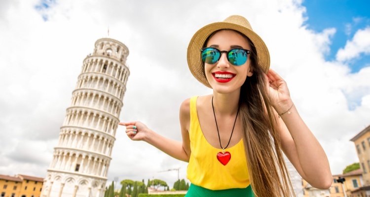 woman in front of tower of pisa, italy