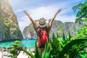 woman traveler enjoying the view of a forest