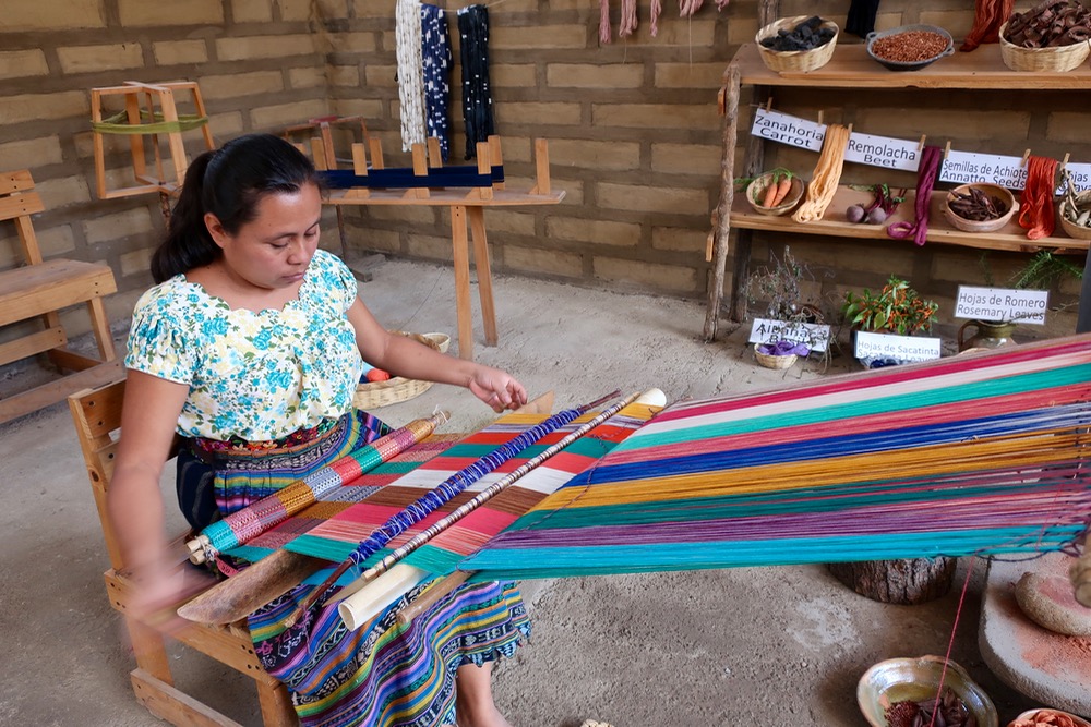 Woman weaving textiles in Guatemala