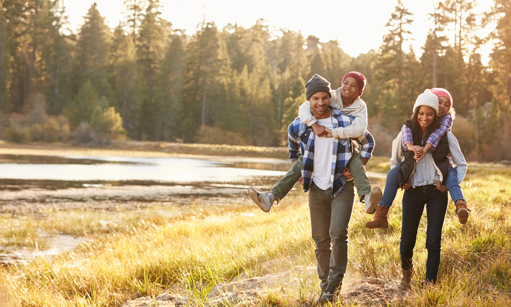 couple on a hiking trail having fun