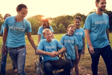 Volunteer group of people for charity donation in the park