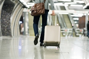 man traveling with Smart_Luggage