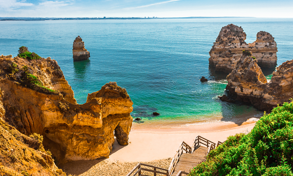 200 wooden stairs leading to Praia do Camilo, Algarve, Portugal