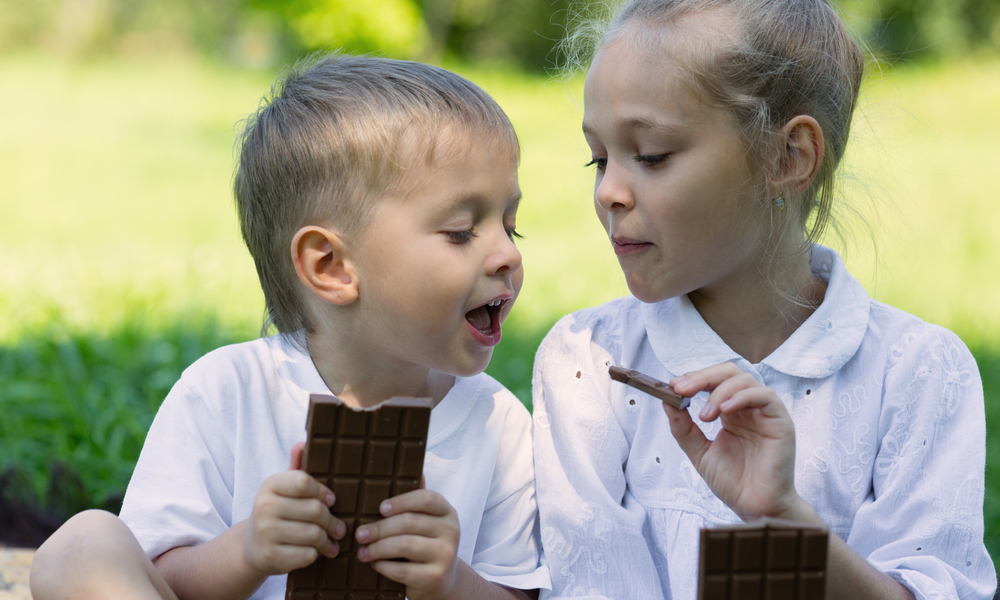 two kids enjoying some Chocolate