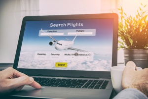 man booking flight online