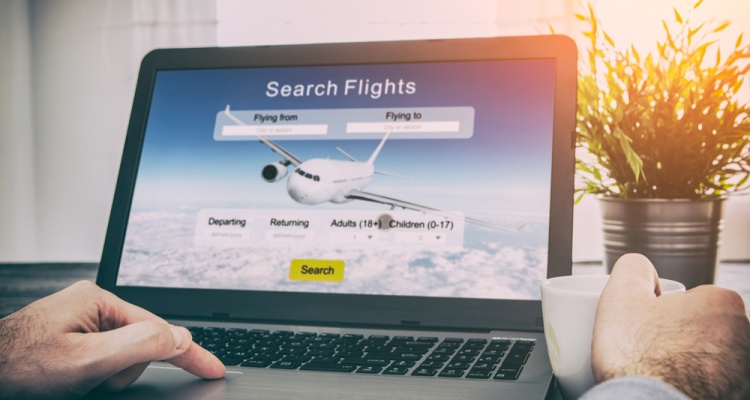 man booking flight online