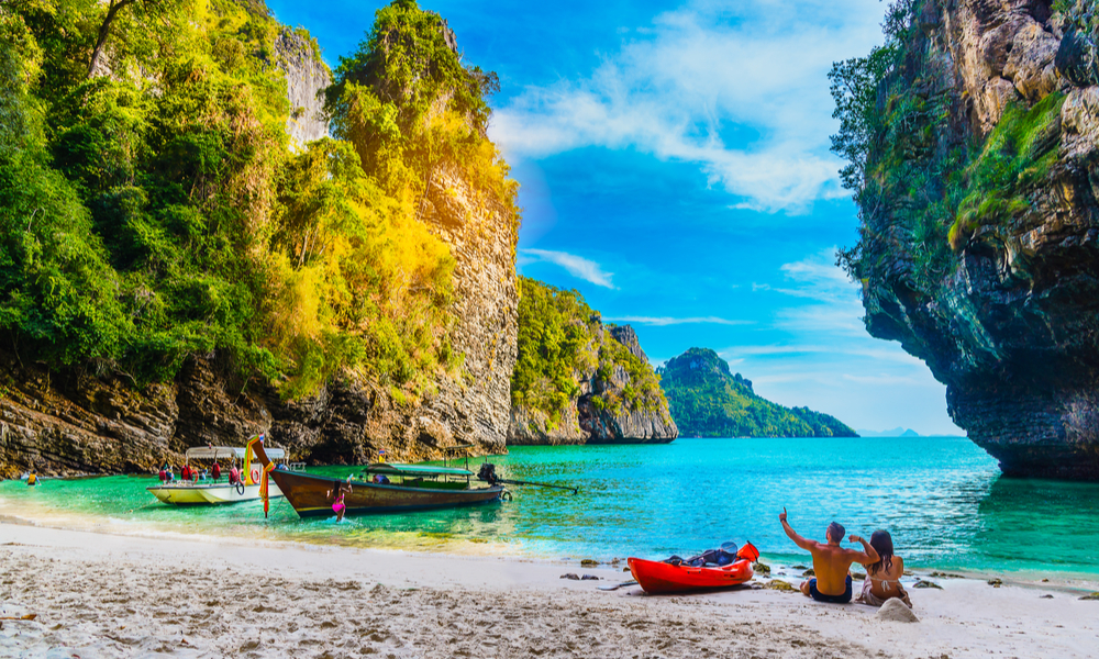 Landscape of natural sea beach on small island, Activity happy couple traveler, Poda island, Andaman sea, Krabi, Travel Thailand