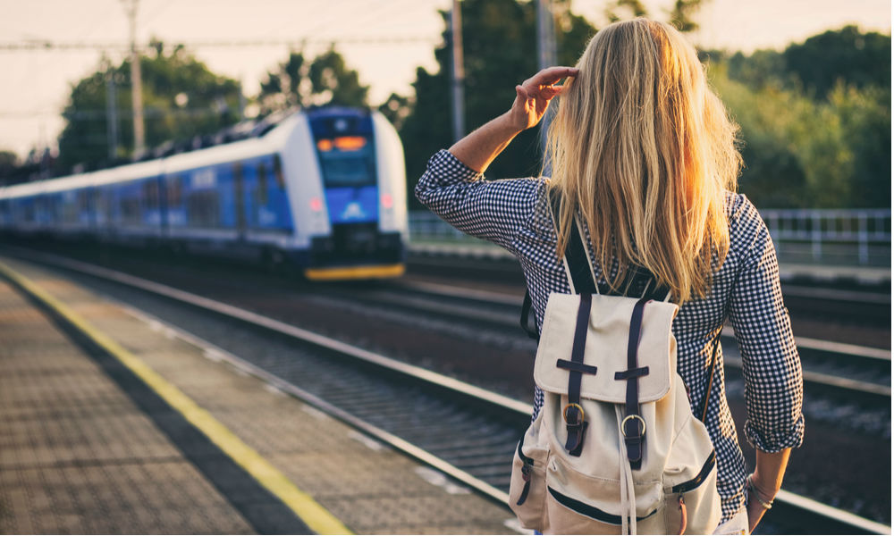 Backpacker travelling through Europe by train.