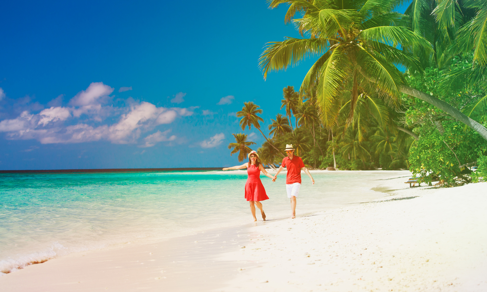 happy loving couple enjoy tropical beach