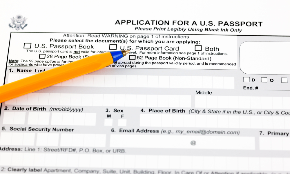 Application for a U.S. passport form with ballpoint pen