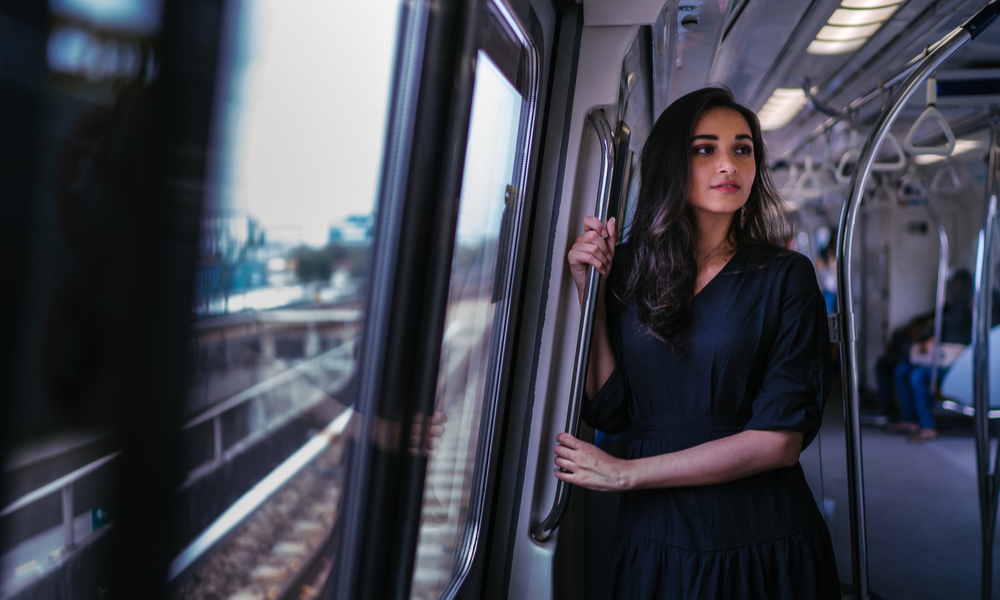 Indian Asian woman taking the train alone