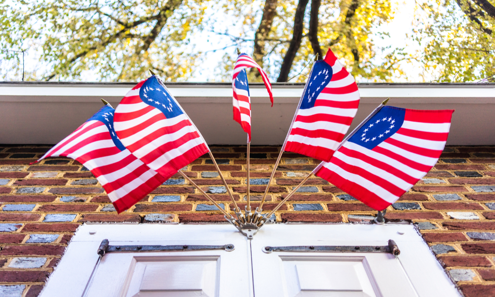 Old American flags with a ring on the building