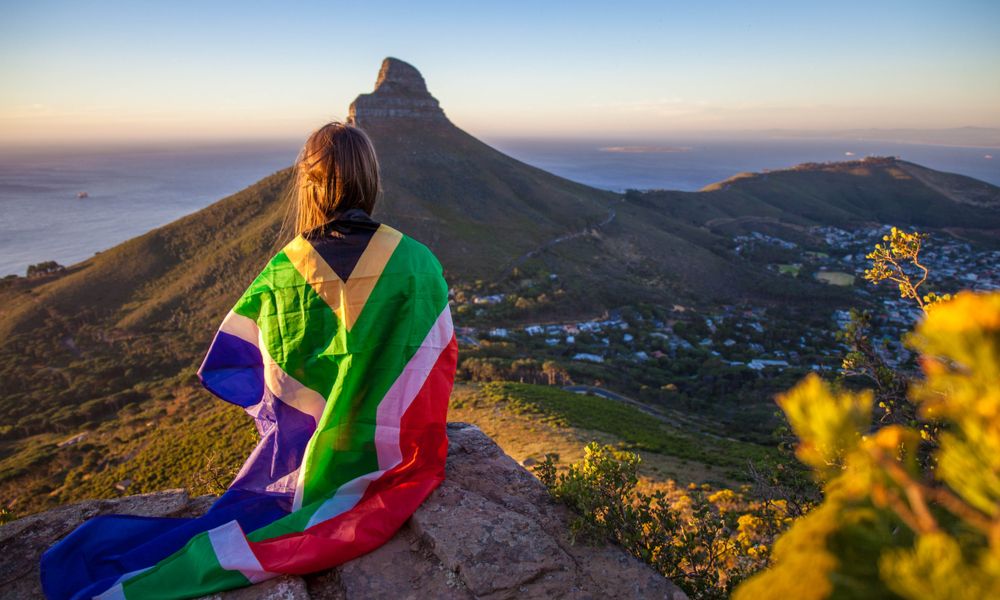 Girl holding a South African flag 