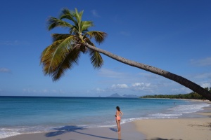 Woman on the beach in Martinique island