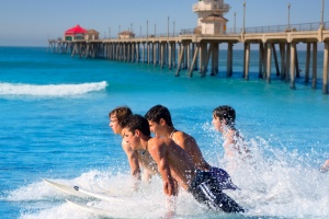 men surfing on huntington beach CA