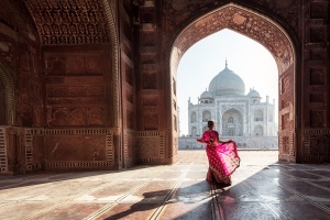 woman in front of Taj Mahal