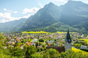 Things to do in liechtenstein: Landscape view on Balzers village with saint Nicholas church in Liechtenstein