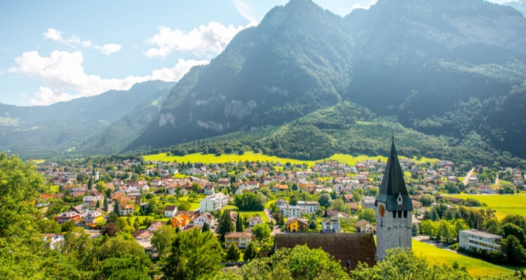 Things to do in liechtenstein: Landscape view on Balzers village with saint Nicholas church in Liechtenstein