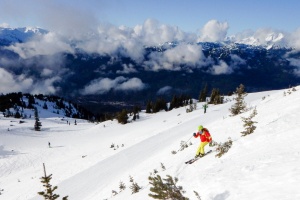 The Best Ski Towns That Also Have Beautiful Landscapes:a skier on whistler slope, BC, Canada