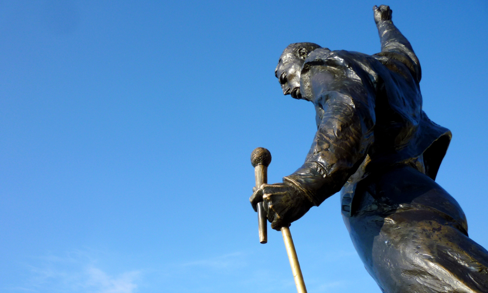 Montreux switzerland vacation: Statue of Freddie Mercury, the singer of the rock band - Queen, settled in Montreux Lake Side