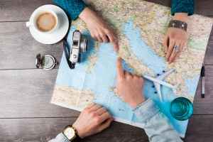 How to Plan a Vacation: Guys Planning with Map