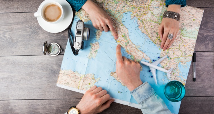 How to Plan a Vacation: Guys Planning with Map