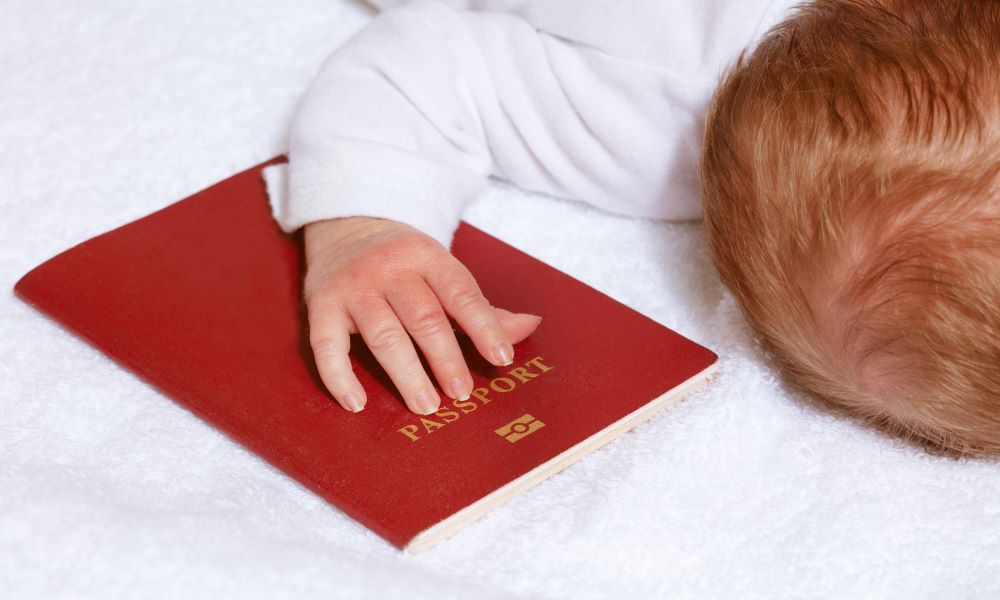 red baby passport photo