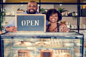 Support Small Businesses While Traveling - Couple in Bakery