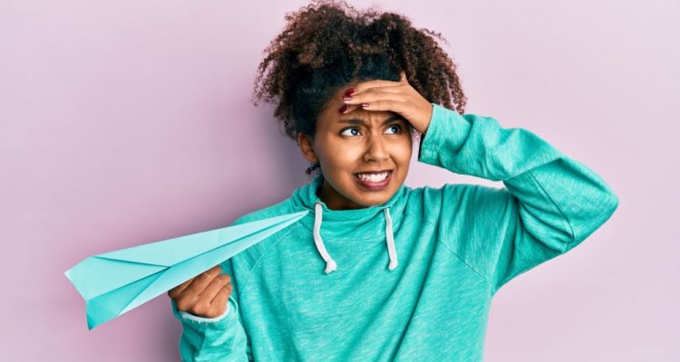 Woman frustrated by lack of airplane etiquette